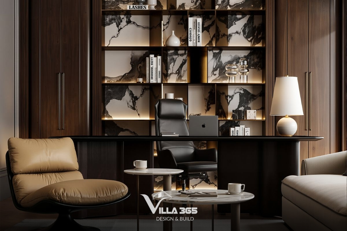 Ghế đơn bọc da màu nâu bò với kiểu dáng mềm mại là "điểm nghỉ" thị giác, giúp không gian bớt cứng nhắc và thêm phần thoải mái