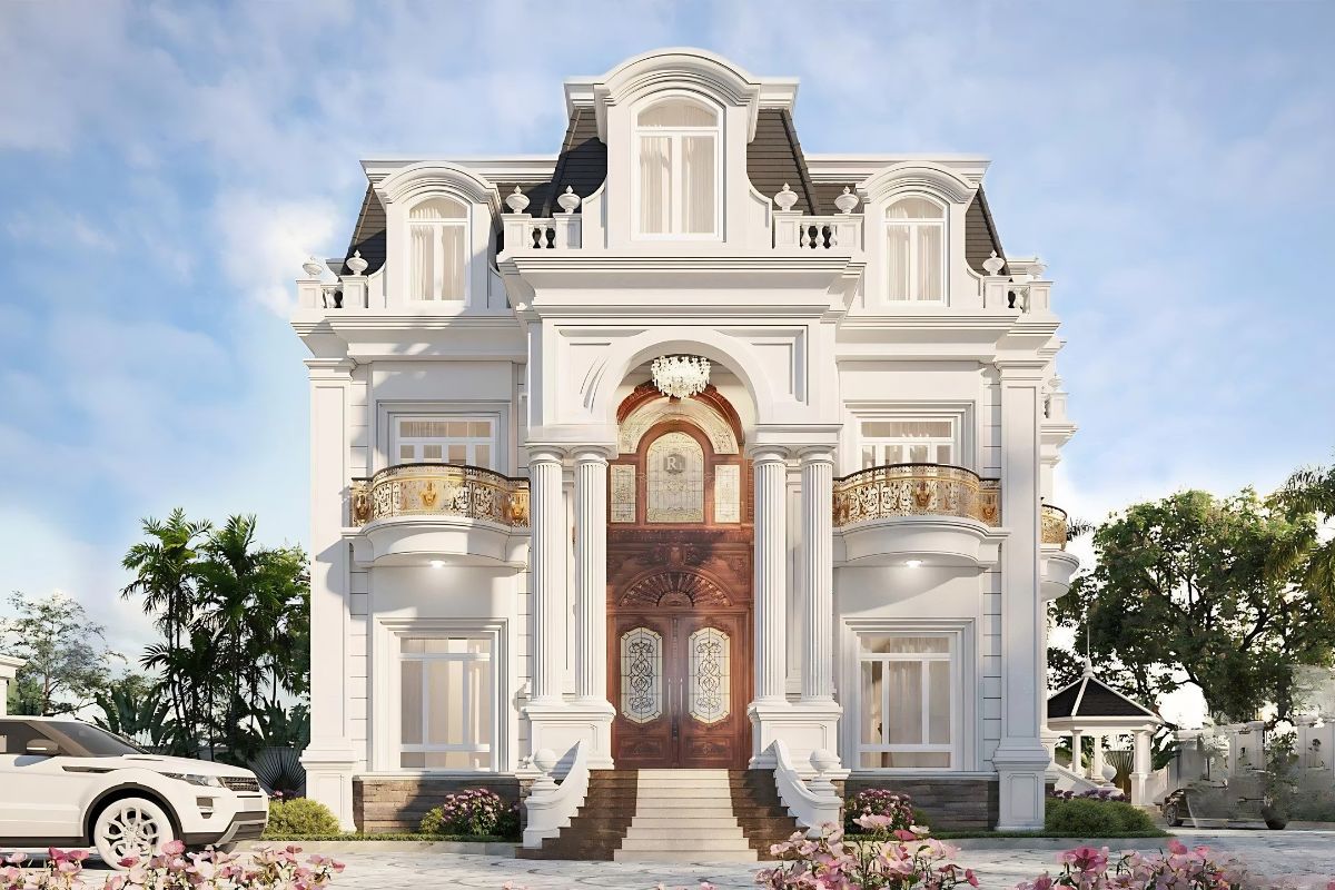 Bố cục đối xứng giúp biệt thự 2 tầng mái Mansard (682m2 - Nhà Bè - CĐT: Anh Mạnh) đạt được sự cân đối và hài hòa trong kiến trúc (Ảnh: Sưu tầm)