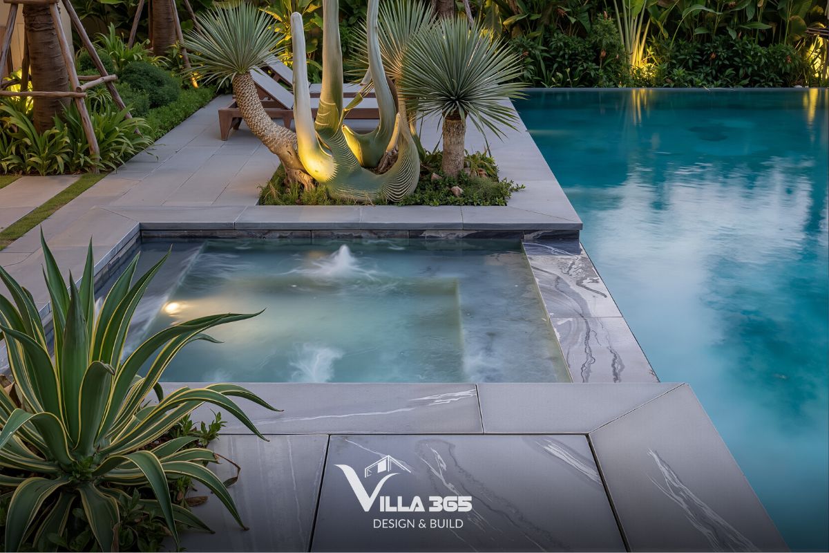 Inner Calm Villa - Biệt thự cân bằng đặc – rỗng linh hoạt, đưa trải nghiệm nghỉ dưỡng vào không gian sống 5 Các ánh đèn vàng ấm áp hắt từ dưới gốc cây và các rãnh tường tạo hiệu ứng tương phản lung linh cho khu vườn khi chiều tà