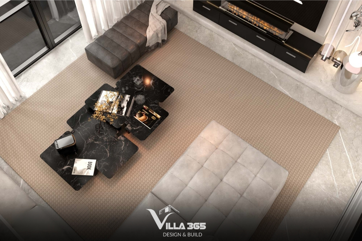 Việc sử dụng sofa nỉ cao cấp, bàn trà mặt đá tự nhiên và các diện tường ốp gỗ không chỉ mang lại vẻ sang trọng mà còn ưu tiên các vật liệu có nguồn gốc từ tự nhiên, bền bỉ theo thời gian 