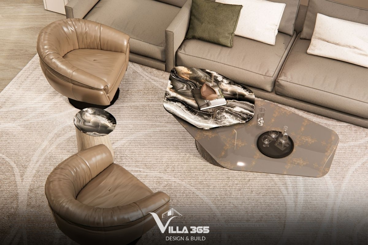 Ghế sofa màu be và ghế bành bọc da màu nâu đất đem lại sự thoải mái, thư giãn tối đa 