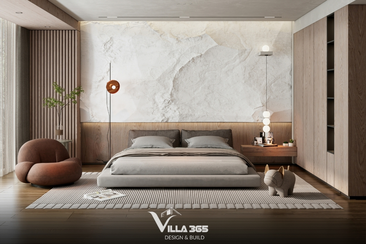 Thay vì trang trí bằng nhiều tranh ảnh, kiến trúc sư chỉ sử dụng duy nhất một mảng tường đá điêu khắc nhám để làm điểm nhấn