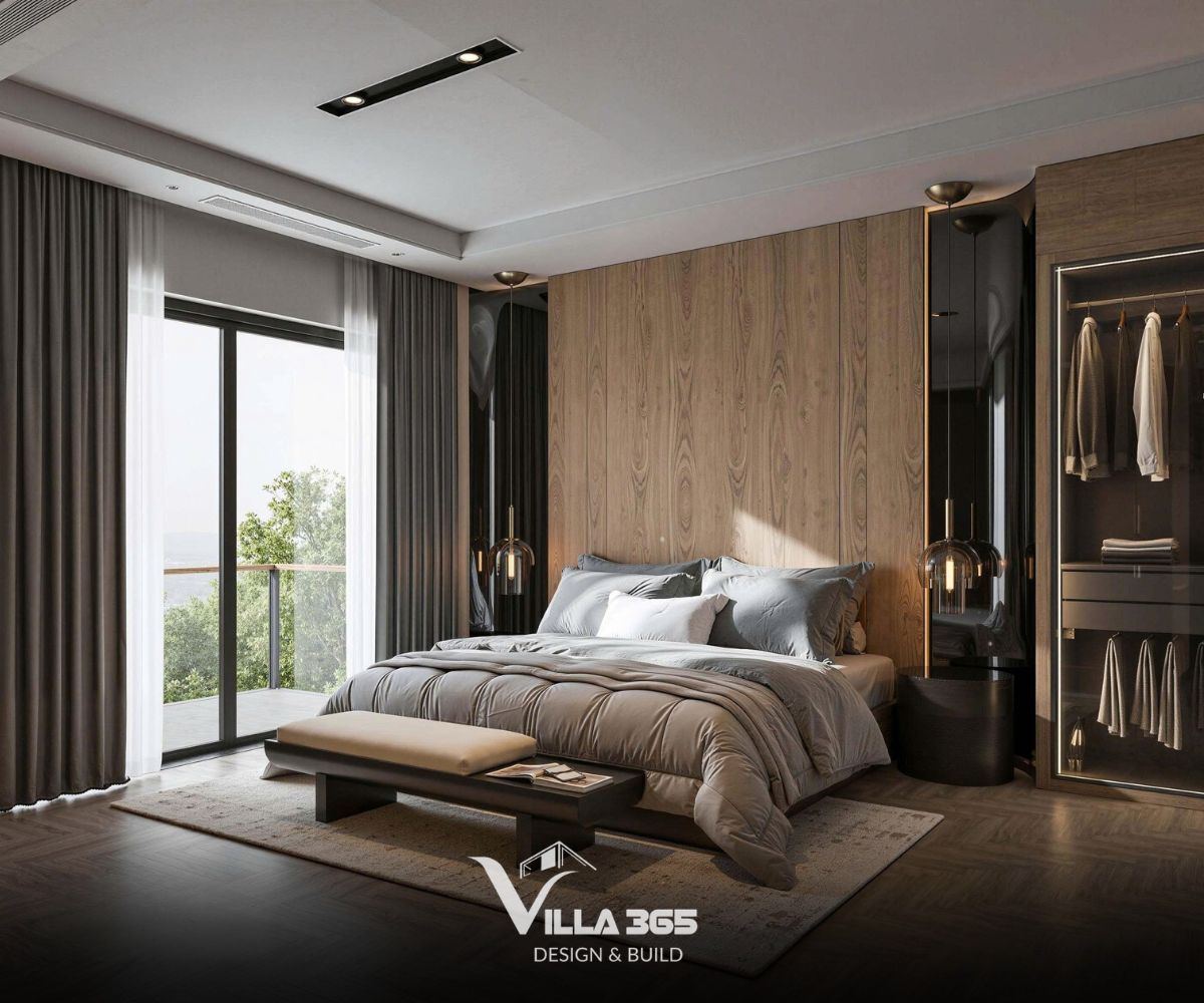 Hệ cửa kính lớn sát trần dẫn ra ban công xanh mát, giúp không khí trong phòng luôn được lưu thông và tràn ngập ánh sáng tự nhiên 