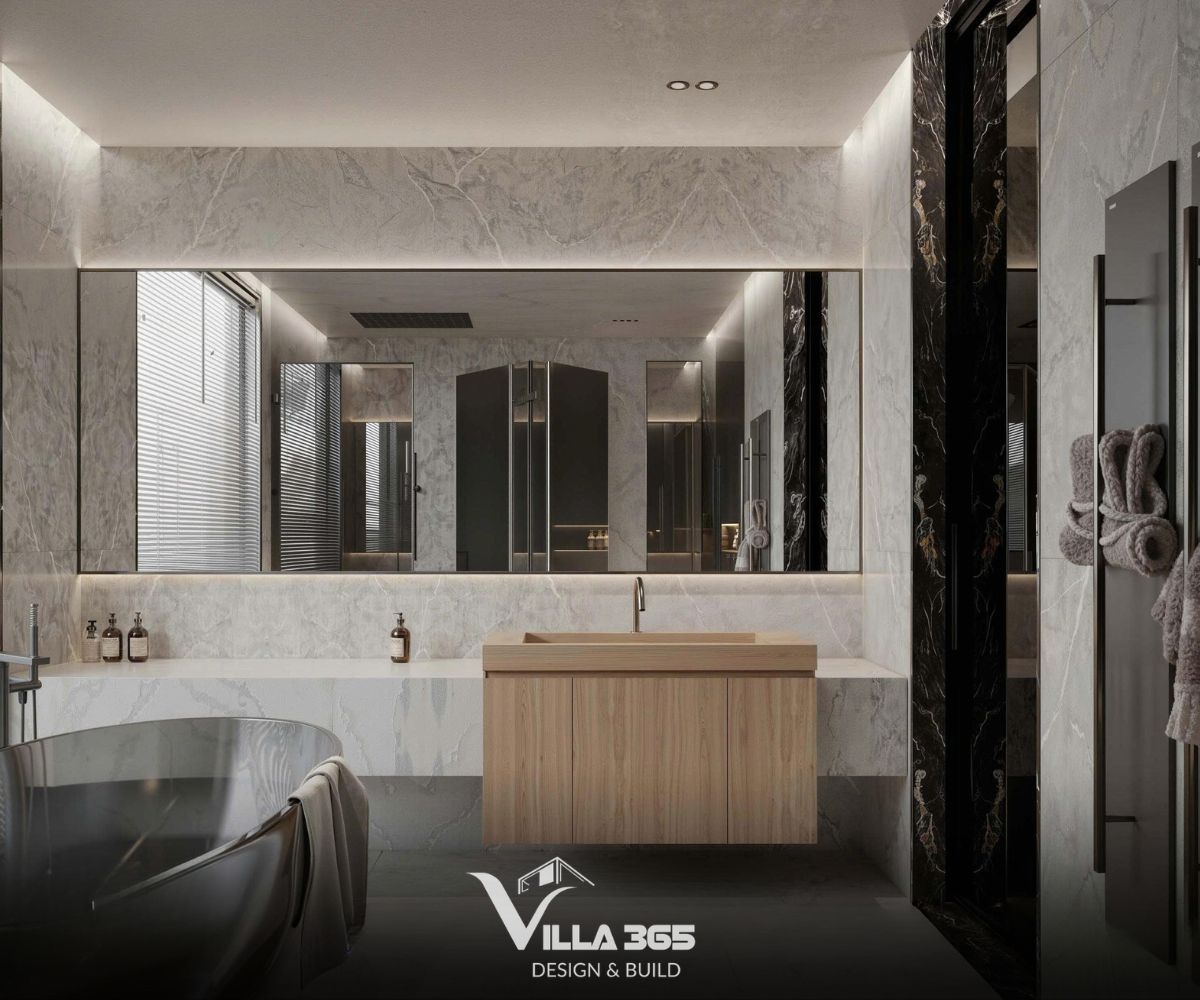 Sự kết hợp giữa các mảng tường đá marble trắng vân mây và các cột đá đen bóng gương tạo nên sự tương phản mạnh mẽ, mang đậm hơi thở của kiến trúc đương đại