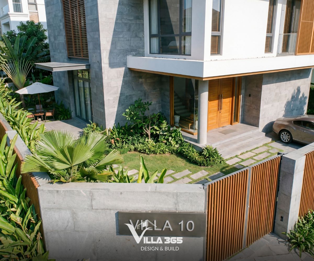 Phong Vy Villa – Đóng – mở hài hòa trong ngôn ngữ hình khối đương đại 8 Đá ốp tự nhiên ở tầng 1 tạo điểm tựa thị giác vững chãi cho toàn bộ khối nhà phía trên