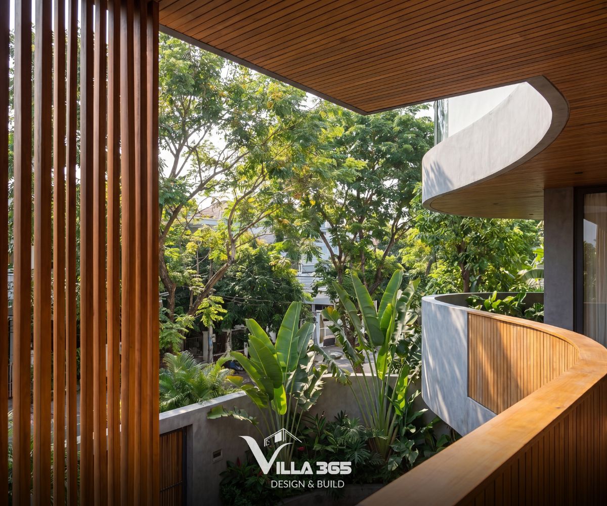 The Flow Villa – Giải pháp kiến trúc xanh cho biệt thự phố lô góc 12 Đường cong được sử dụng để làm mềm khối bê tông và tạo chuyển tiếp liền mạch giữa hai mặt tiền