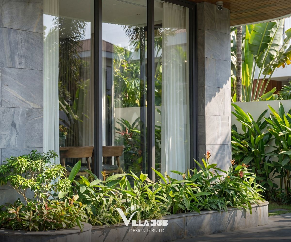 Cầm Villa – “Thanh âm” dịu dàng giữa phố thị 12 Bồn cây thấp ôm lấy chân cửa vừa có tác dụng trang trí vừa không chắn tầm nhìn