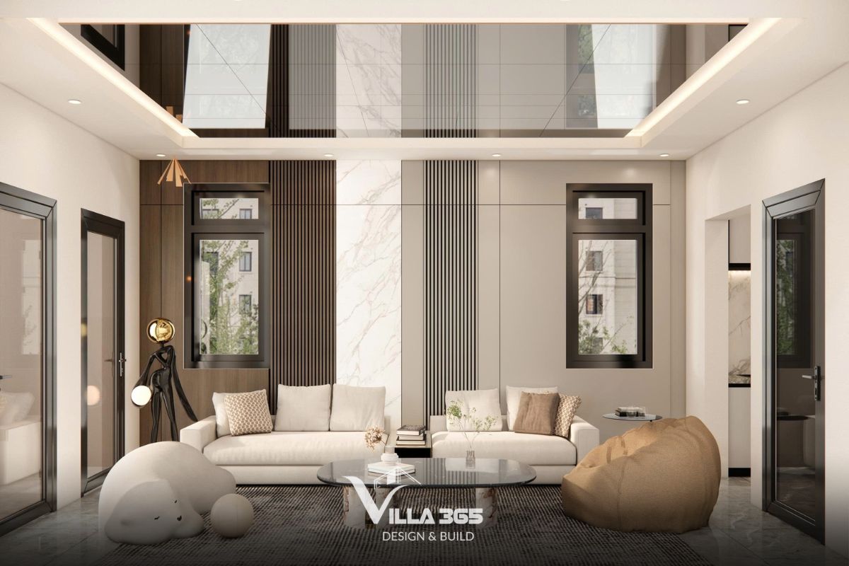 Thiết kế nội thất Đan Villa – Hài hòa và tiện nghi trong ngôi nhà ba thế hệ 8 Khu vực sinh hoạt chung tầng 2 bố trí sofa bo tròn, bọc vải thô màu nâu ấm và trắng kem và bàn trà, tạo góc thư giãn và gắn kết các thành viên