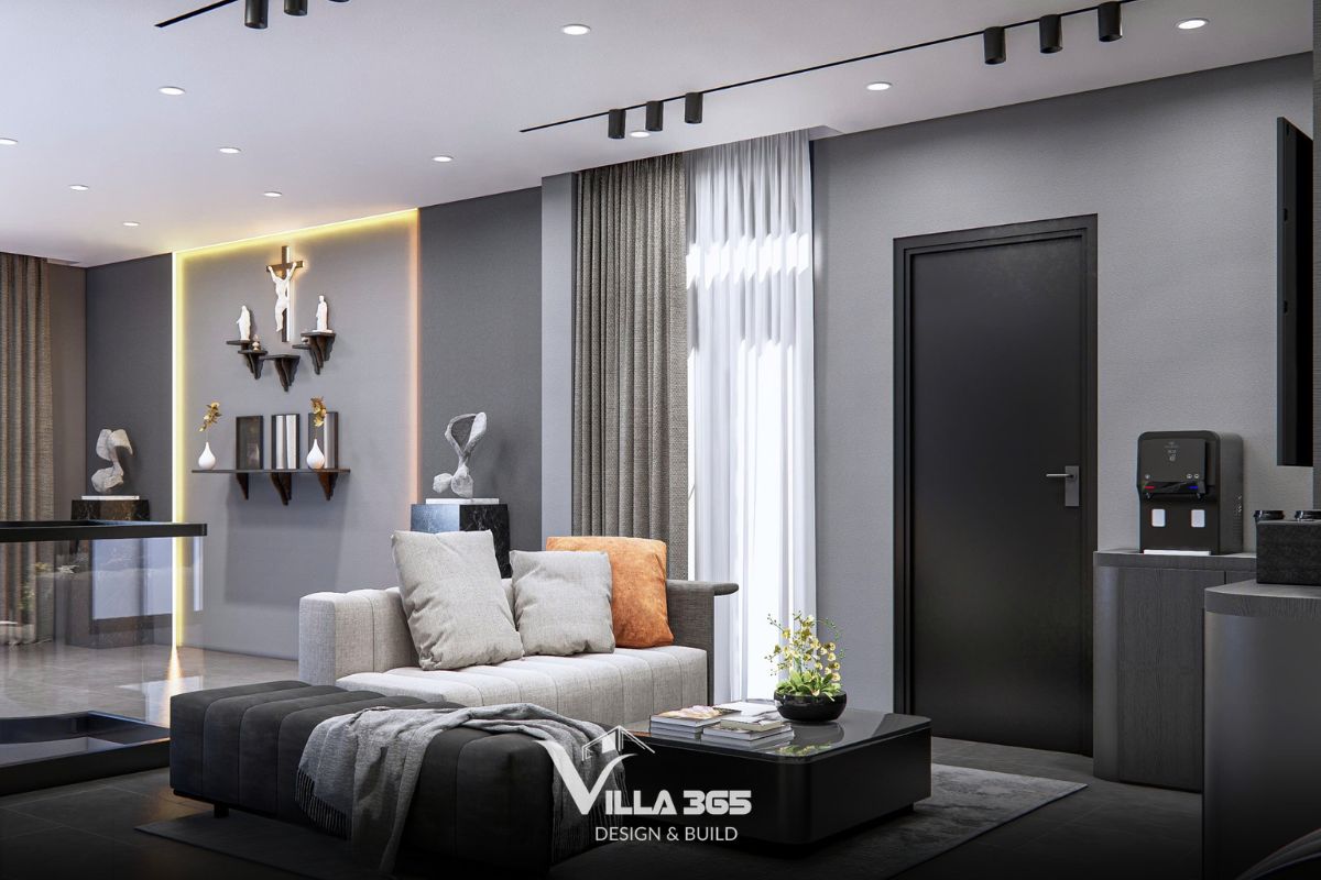 Toàn bộ không gian sử dụng các sắc độ xám khác nhau từ sơn tường, rèm cửa cho đến hệ cửa phòng màu đen mờ, mang lại cảm giác tĩnh lặng và sang trọng 