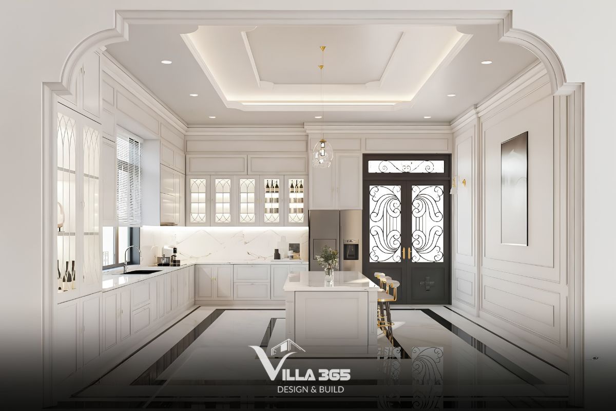 Hệ tủ kịch trần, cánh kính họa tiết và đảo bếp lớn giúp khu bếp – ăn vừa tối ưu công năng, vừa giữ được vẻ chỉn chu của tổng thể 