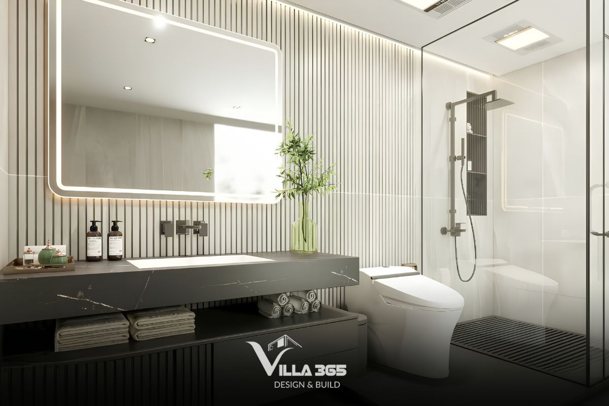 Mặt bàn và chậu rửa đúc liền khối từ đá tự nhiên màu đen với các đường vân mây trắng sang trọng, tích hợp kệ mở phía dưới 