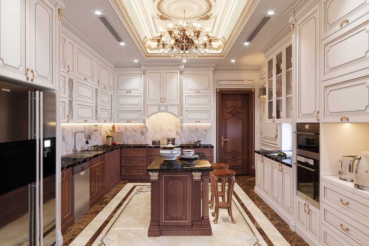 Bàn đảo kích thước lớn vừa là điểm nhấn trung tâm, vừa góp phần củng cố tính đối xứng của toàn bộ căn bếp  (Ảnh: Sưu tầm)