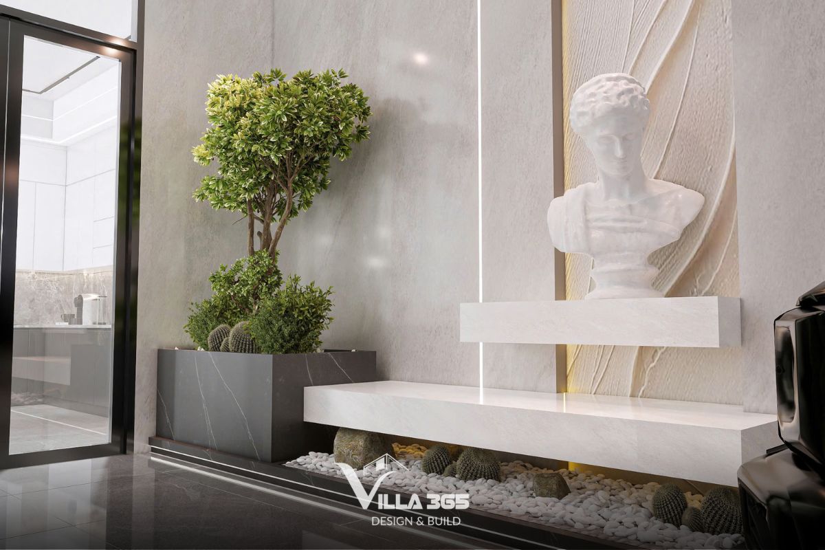 Sảnh đón được thiết kế tinh tế với sự kết hợp hài hòa giữa mảng xanh thiên nhiên, vật liệu cao cấp và ánh sáng nghệ thuật