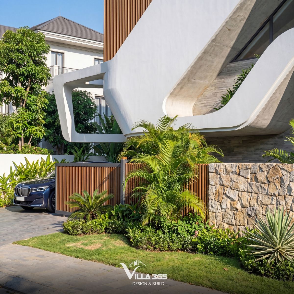 Ribbon Villa - Những đường cong dẫn lối gió trời và ánh sáng 11 Những khóm cây nhiệt đới làm mềm lớp vỏ bê tông, đồng thời gạn bớt bụi, tiếng ồn và nhịp sống xô bồ từ phố thị.