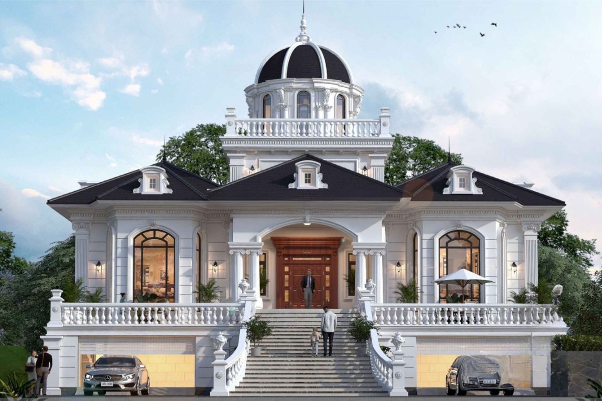 Gara đặt lệch về khối phụ giúp biệt thự tân cổ điển duy trì điểm nhấn tại hệ cột, mái sảnh và ban công chính (Ảnh: Sưu tầm)