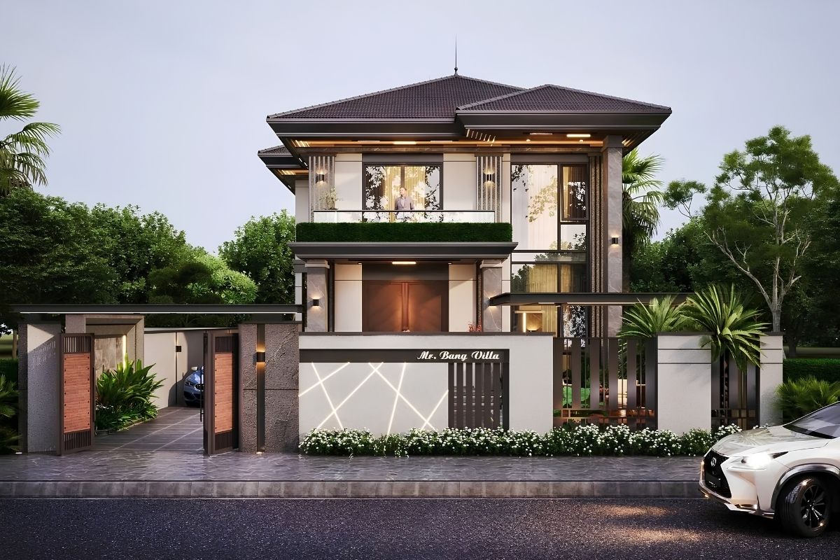 50+ Mẫu Cổng Biệt Thự Đẹp Sang Trọng 2026 35 Cổng biệt thự sân vườn kết hợp lối xe, cây xanh và ánh sáng tạo chiều sâu cho không gian đón (Ảnh: Sưu tầm)